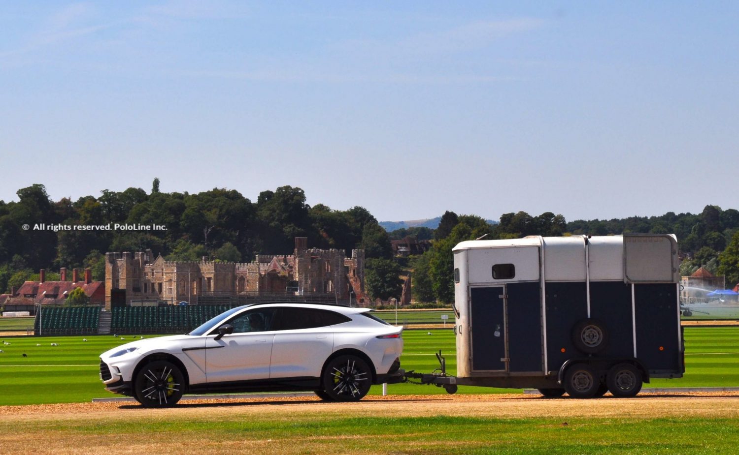 Aston Martin DBX towing horse trailer